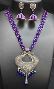 Braided pink and navy blue silk thread necklace with matching earrings