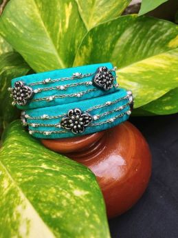 Blue embroidered fabric bangles